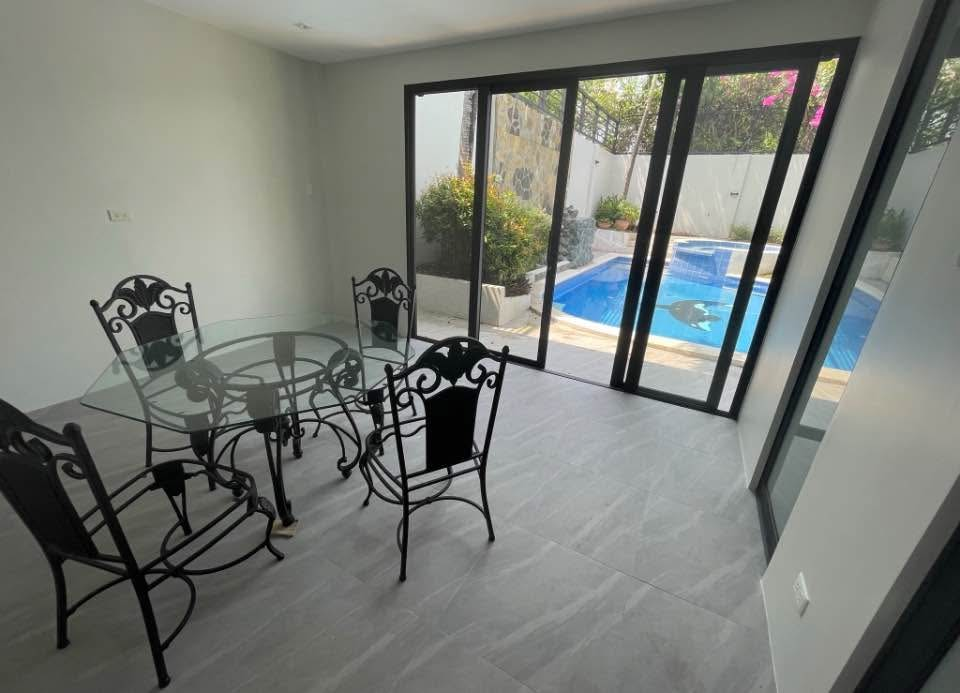 House for sale in Havila Rizal with overlooking view, Modern 4-bedroom home with jacuzzi and garden, House for sale in Havila Taytay, Taytay Rizal house with swimming pool